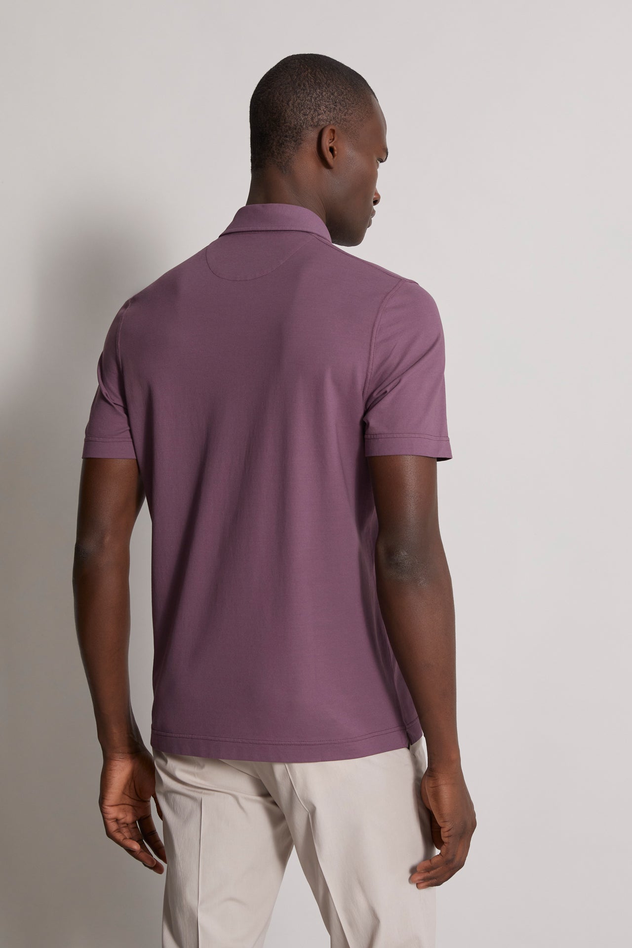 men's iconic cotton polo jersey in violet indigo - back view 