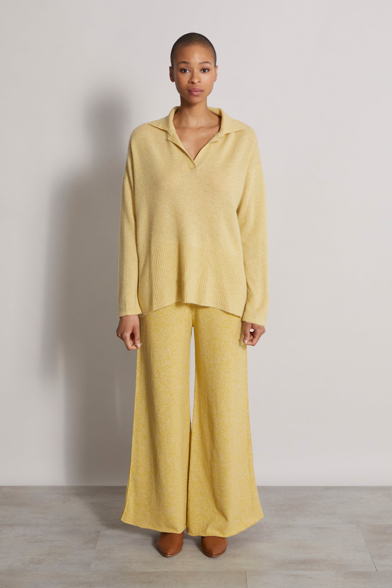women's cashmere knitted polo sweater in yellow - front view 