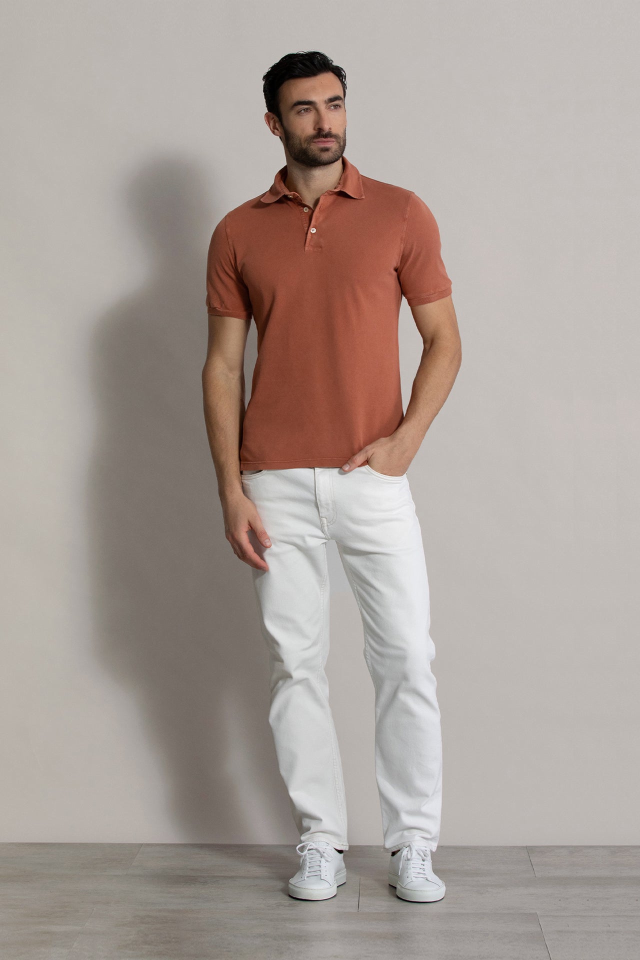 Model with North short sleeves cotton polo in orange