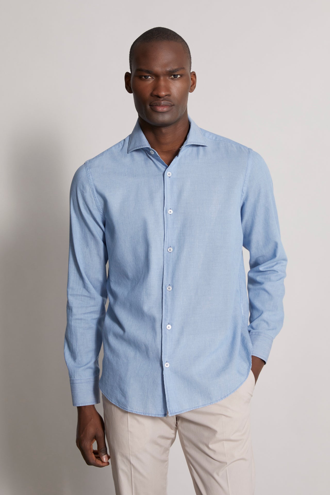 men's designer denim shirt with long sleeves in steel blue - front view
