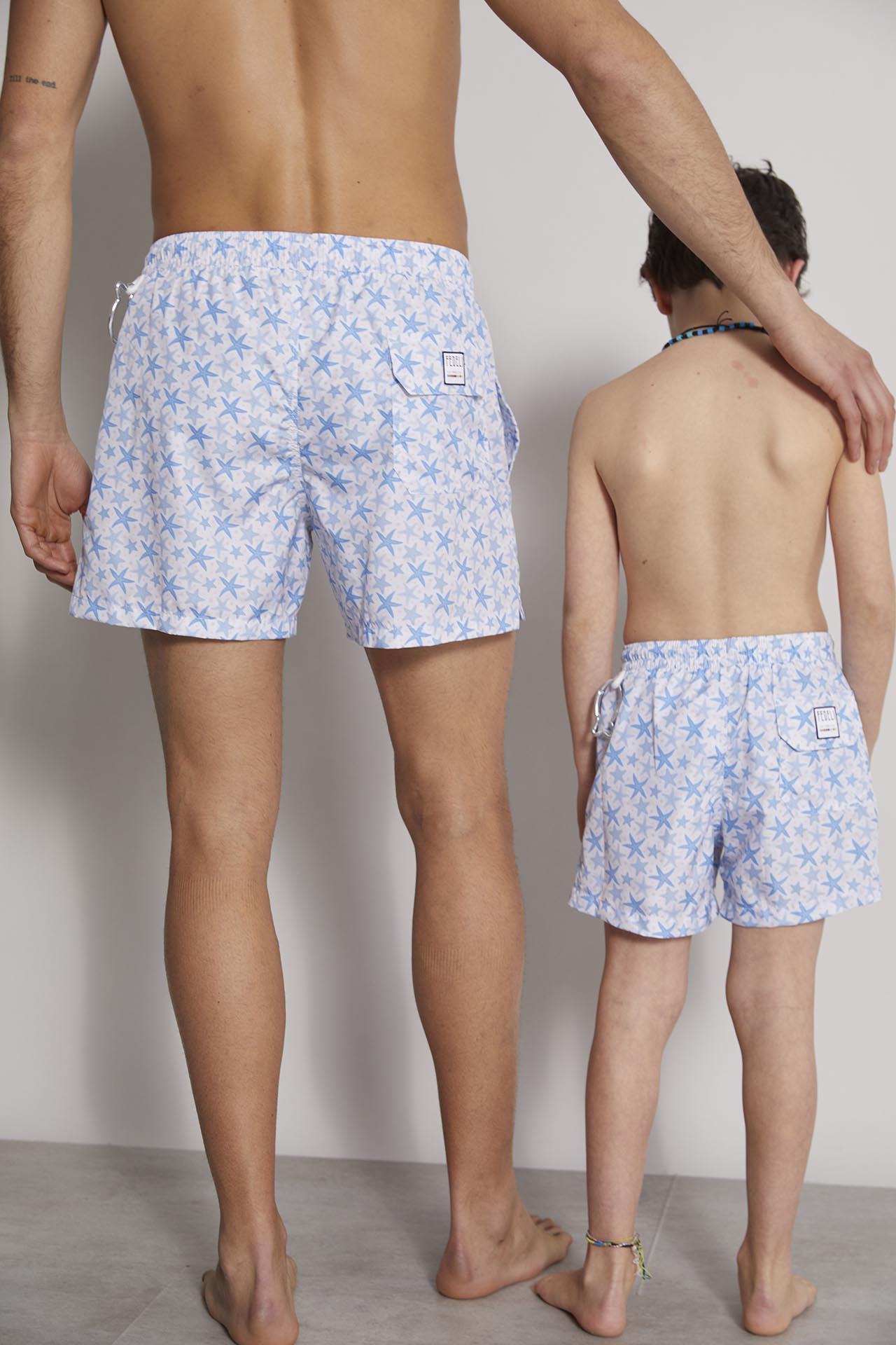 father and son matching swim trunks - blue star pattern 