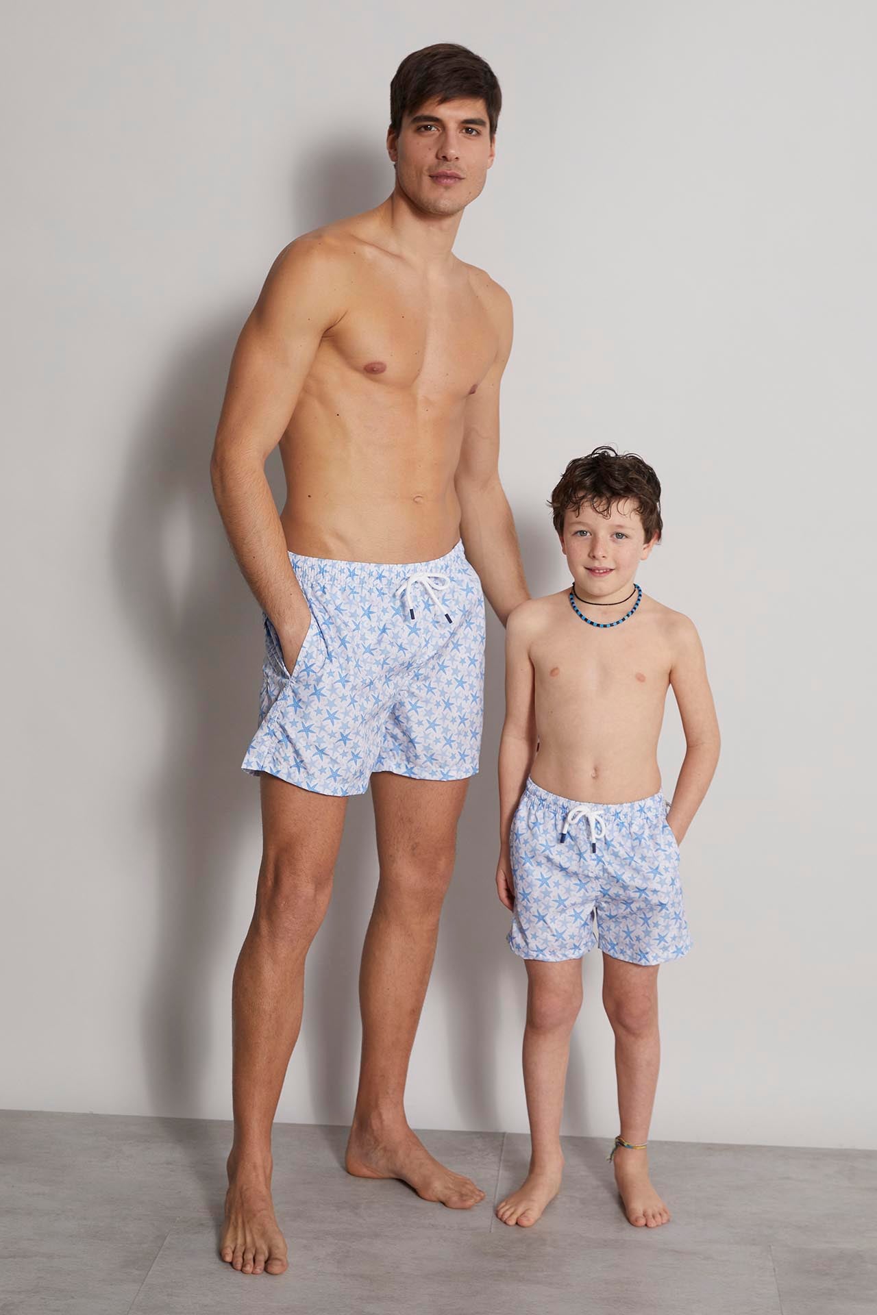 Men's sustainable designer swim trunks with blue stellamarina patterns Madeira