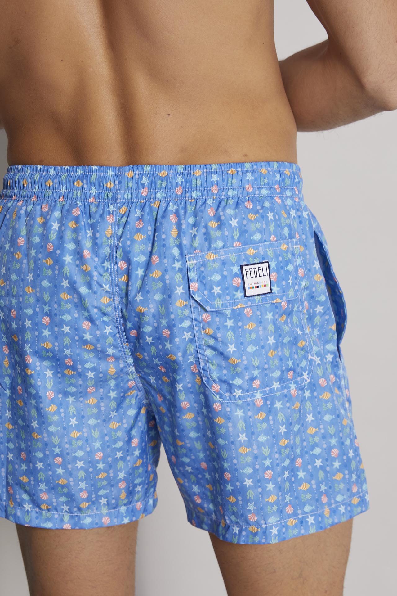 sustainable designer swim trunks madeira - blue shells pattern